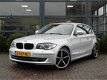 BMW 1-serie - 120i High Executive*AC Schnitzer 18 Inch*Memory seats*Harmencardon*Xenon*Proff.Navigat - 1 - Thumbnail