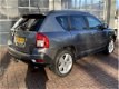 Jeep Compass - 2.4 Limited 4WD BJ 2011 km 172.0000 NAP /LEER/TREKHAAK/INRUIL DEALER ONDERHOUDEN - 1 - Thumbnail