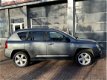 Jeep Compass - 2.4 Limited 4WD BJ 2011 km 172.0000 NAP /LEER/TREKHAAK/INRUIL DEALER ONDERHOUDEN - 1 - Thumbnail