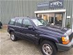 Jeep Grand Cherokee - 4.0i Laredo - 1 - Thumbnail