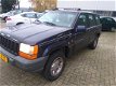 Jeep Grand Cherokee - 4.0i Laredo - 1 - Thumbnail