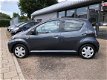 Toyota Aygo - 1.0-12V Cool AIRCO 5 DEURS ELEC RAMEN NIEUWE APK 58DKM METAAL KLEUR - 1 - Thumbnail