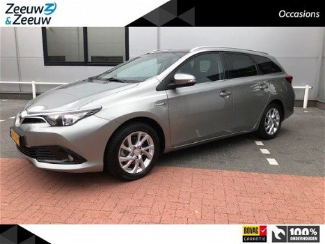 Toyota Auris Touring Sports - 1.8 Hybrid Navi Pano dak NL auto - 1