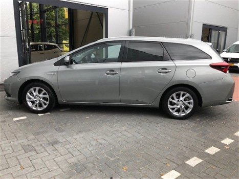 Toyota Auris Touring Sports - 1.8 Hybrid Navi Pano dak NL auto - 1