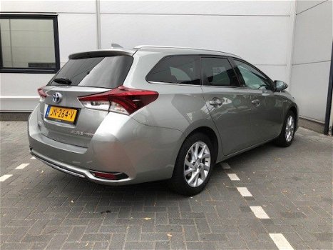 Toyota Auris Touring Sports - 1.8 Hybrid Navi Pano dak NL auto - 1