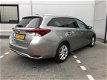 Toyota Auris Touring Sports - 1.8 Hybrid Navi Pano dak NL auto - 1 - Thumbnail