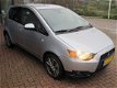 Mitsubishi Colt - 1.3 Edition Two*AUTOMAAT*AIRCO(AUTOMATISCH)*CRUISE CONTROL* PARKEERHULP ACHTER*LM - 1 - Thumbnail
