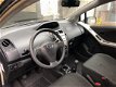 Toyota Yaris - 1.0 VVTi Acces AIRCO/NL Auto/El.Ramen - 1 - Thumbnail