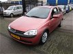 Opel Corsa - 1.2-16V Comfort, zeer nette auto - 1 - Thumbnail