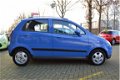 Chevrolet Matiz - 1.0 4 CIL / 5 DEURS / 4 ELEKTR.RAMEN / AIRCO / PARKEERSENSOREN - 1 - Thumbnail