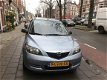 Mazda 2 - 2 1.4 Exclusive 5-drs. Airco, Centraal, Elektrisch Ramen, Stuurbekr - 1 - Thumbnail