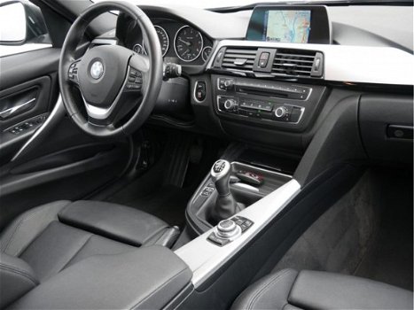 BMW 3-serie Touring - 316d 116pk High Executive xenon / leer / 16inch / navigatie - 1