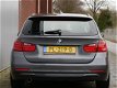 BMW 3-serie Touring - 316d 116pk High Executive xenon / leer / 16inch / navigatie - 1 - Thumbnail