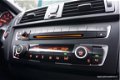 BMW 1-serie - 116d Xenon, Navigatie Prof, Leder, Dealeronderhouden - 1 - Thumbnail