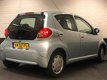 Toyota Aygo - 1.0-12V + AUX, Elec.Pakket, 5DR'S, Lage km, APK JUL-2020 - 1 - Thumbnail