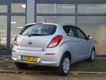 Hyundai i20 - 1.2i i-Motion Black Pack Unieke km stand - 1 - Thumbnail