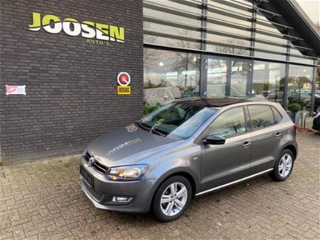 Volkswagen Polo - 1.2 TSI HIGHL. ED. AUTOMAAT - 1