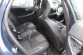 Volvo V40 - 1.6 D2 Momentum Business (115pk) Half-Leder/ Navi/ Clima/ Cruise/ Elek. pakket/ Isofix/ - 1 - Thumbnail