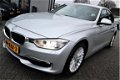 BMW 3-serie - 320i High Executive | Automaat | Xenon | Navigatie | Stoelverwarming | Comfort Leder | - 1 - Thumbnail