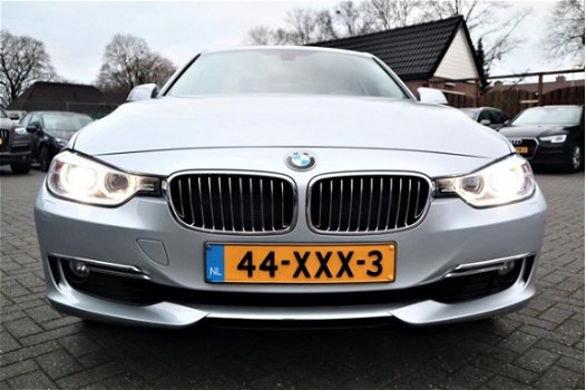 BMW 3-serie - 320i High Executive | Automaat | Xenon | Navigatie | Stoelverwarming | Comfort Leder | - 1