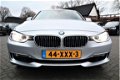 BMW 3-serie - 320i High Executive | Automaat | Xenon | Navigatie | Stoelverwarming | Comfort Leder | - 1 - Thumbnail