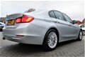 BMW 3-serie - 320i High Executive | Automaat | Xenon | Navigatie | Stoelverwarming | Comfort Leder | - 1 - Thumbnail