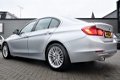 BMW 3-serie - 320i High Executive | Automaat | Xenon | Navigatie | Stoelverwarming | Comfort Leder | - 1 - Thumbnail