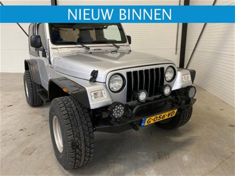 Jeep Wrangler - 4.0L Sport Silver Bullet - 1