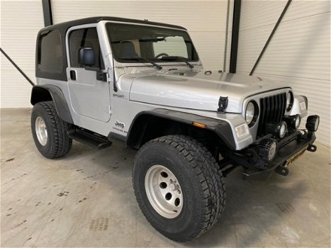 Jeep Wrangler - 4.0L Sport Silver Bullet - 1