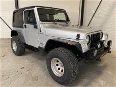 Jeep Wrangler - 4.0L Sport Silver Bullet