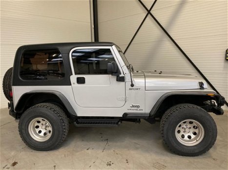 Jeep Wrangler - 4.0L Sport Silver Bullet - 1