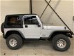 Jeep Wrangler - 4.0L Sport Silver Bullet - 1 - Thumbnail