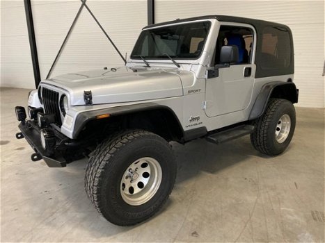 Jeep Wrangler - 4.0L Sport Silver Bullet - 1