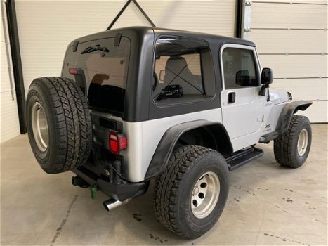 Jeep Wrangler - 4.0L Sport Silver Bullet - 1