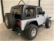 Jeep Wrangler - 4.0L Sport Silver Bullet - 1 - Thumbnail