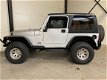 Jeep Wrangler - 4.0L Sport Silver Bullet - 1 - Thumbnail