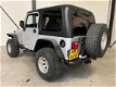 Jeep Wrangler - 4.0L Sport Silver Bullet - 1 - Thumbnail