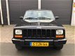 Jeep Cherokee - 4.0i Limited automaat - 1 - Thumbnail