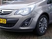 Opel Corsa - 1.4-16V Design Edition 101PK 5-drs Automaat, airco, cruise, navi, trekhaak, pdc RIJKLAA - 1 - Thumbnail