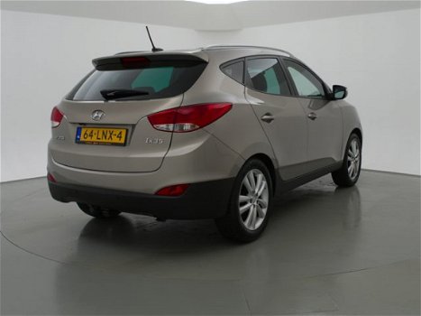 Hyundai ix35 - 2.0i AUT. 164 PK 4WD I-CATCHER + PANORAMA / LEDER / CAMERA / NAVIGATIE - 1