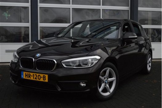 BMW 1-serie - 118i EDE Corporate Lease Essential | AUDIO-NAVI SYSTEEM BUSINESS / SPARKLING BROWN MET - 1