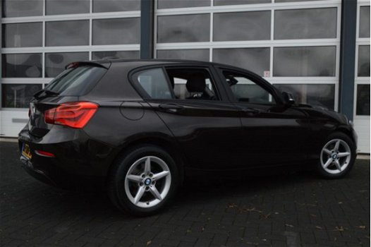 BMW 1-serie - 118i EDE Corporate Lease Essential | AUDIO-NAVI SYSTEEM BUSINESS / SPARKLING BROWN MET - 1