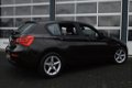 BMW 1-serie - 118i EDE Corporate Lease Essential | AUDIO-NAVI SYSTEEM BUSINESS / SPARKLING BROWN MET - 1 - Thumbnail