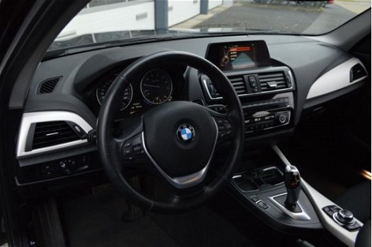 BMW 1-serie - 118i EDE Corporate Lease Essential | AUDIO-NAVI SYSTEEM BUSINESS / SPARKLING BROWN MET - 1