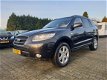 Hyundai Santa Fe - 2.2 CRDi Dynamic Aut. *NAVI+PDC+ECC+CRUISE+TREKHAAK - 1 - Thumbnail