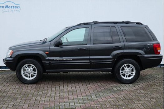 Jeep Grand Cherokee - 4.7i V8 4X4 Automaat, Limited uitv., Leder, Clima, Cruise, Memory stoelen, Lmv - 1