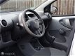 Toyota Aygo - 1.0-12V 125.616 KM*AIRCO*5-DEURS*FINANC. €62 - 1 - Thumbnail