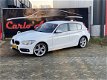 BMW 1-serie - 118i Cent HighExe Aut/Leer/NaviPro *NAP - 1 - Thumbnail