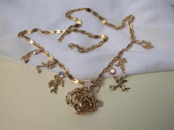 Ketting Kirks Folly goudkleurig met fabelachtige bedels en ringen 76 cm - Afbeelding 3
