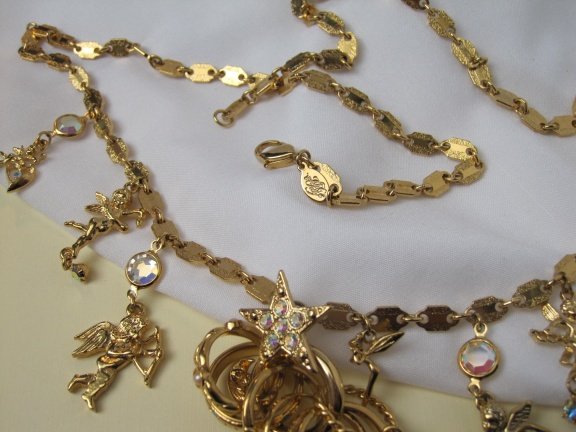 Ketting Kirks Folly goudkleurig met fabelachtige bedels en ringen 76 cm - Afbeelding 6